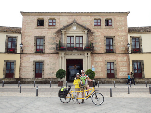 Dennis and Terry Struck pose in front of the 'Alcazar de la Reina'.